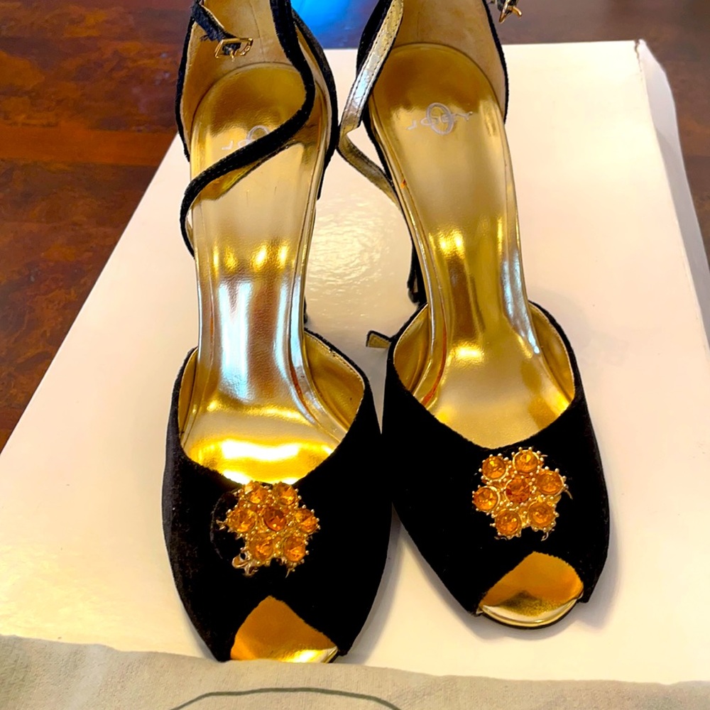 Gorgeous black velvet high heel shoes. Never used.